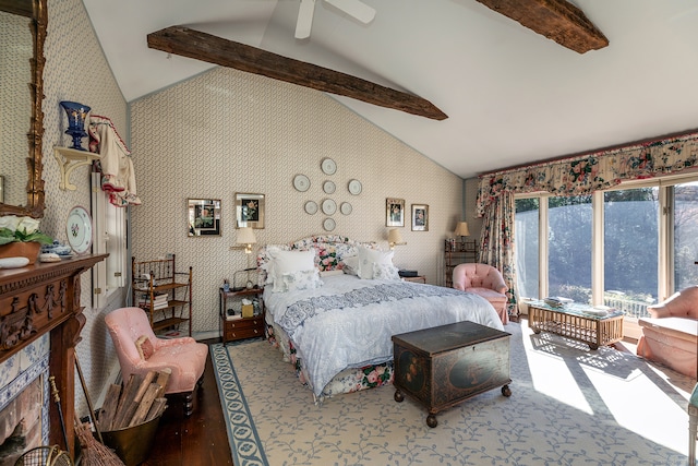 bedroom with vaulted ceiling with beams, ceiling fan, and hardwood / wood-style floors