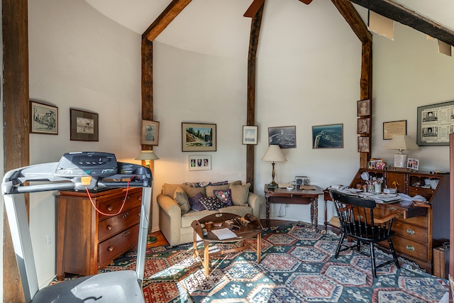 interior space featuring beamed ceiling and high vaulted ceiling