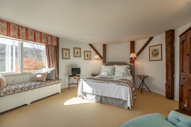 bedroom with light carpet