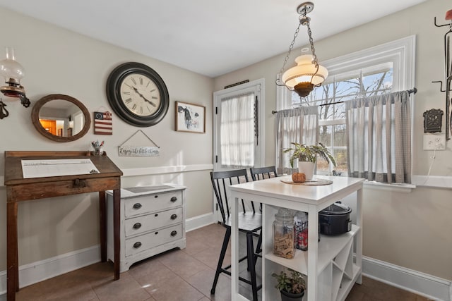 dining room featuring light tile patterned floors