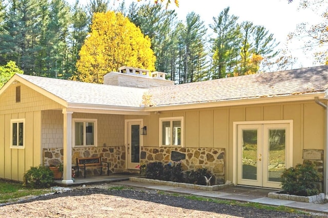 back of property featuring french doors