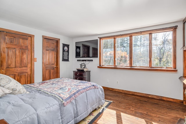 bedroom featuring hardwood / wood-style floors