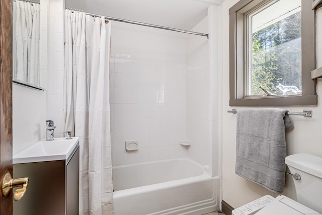 full bathroom featuring shower / bath combination with curtain, vanity, and toilet