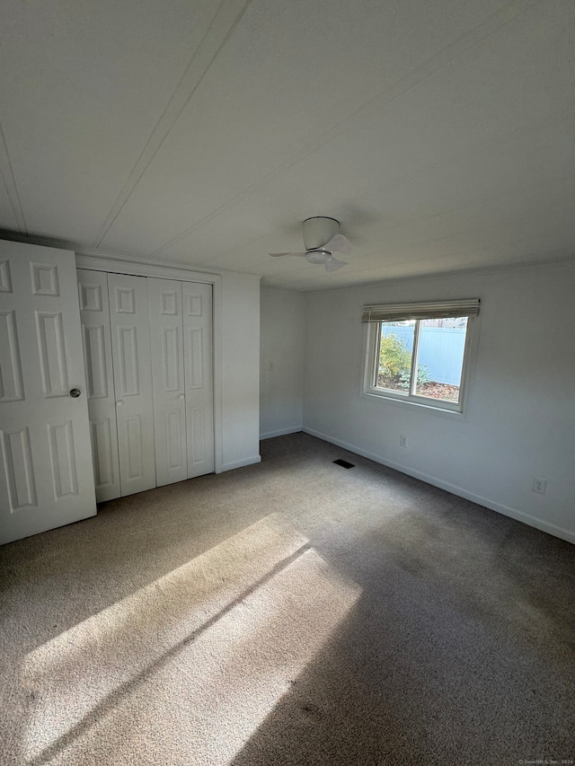 unfurnished bedroom with carpet