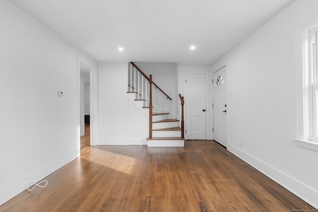 foyer entrance featuring hardwood / wood-style floors