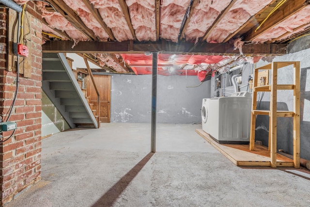 basement featuring washing machine and dryer