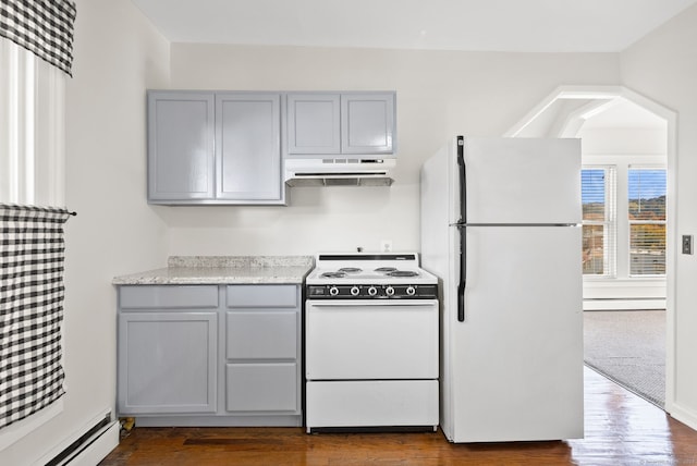 kitchen featuring white appliances, a baseboard radiator, gray cabinets, and hardwood / wood-style floors