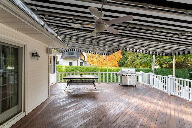 deck featuring a grill