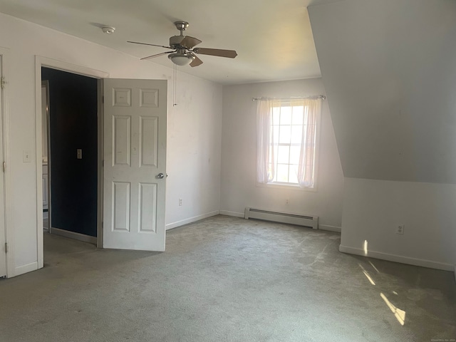 bonus room featuring ceiling fan, light carpet, vaulted ceiling, and baseboard heating