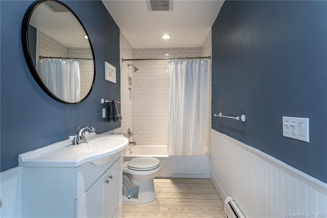 full bathroom with toilet, shower / bath combo with shower curtain, vanity, and wood-type flooring