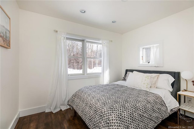 bedroom featuring dark wood-type flooring