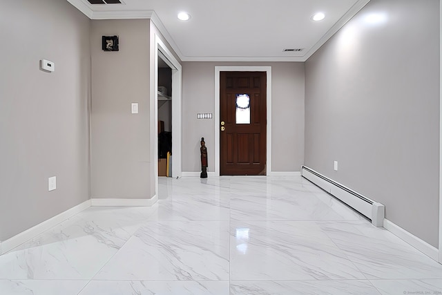 foyer entrance with ornamental molding and a baseboard heating unit