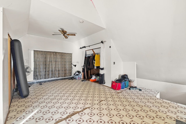 bonus room featuring vaulted ceiling and ceiling fan