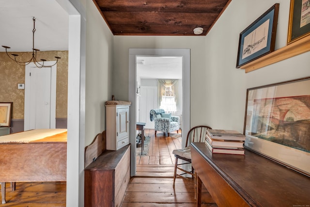 corridor featuring wooden ceiling and wood-type flooring