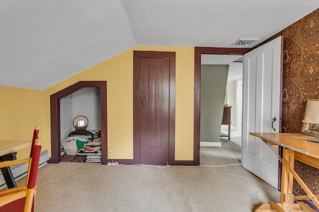 bonus room with carpet floors, visible vents, baseboards, lofted ceiling, and a baseboard radiator
