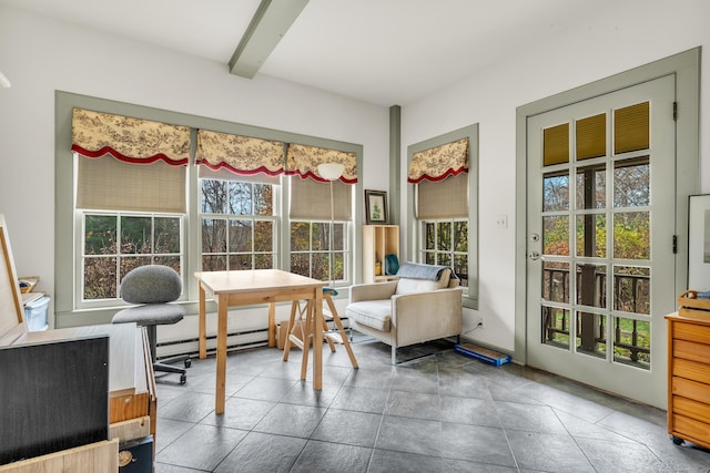 sunroom / solarium featuring a baseboard radiator and beam ceiling