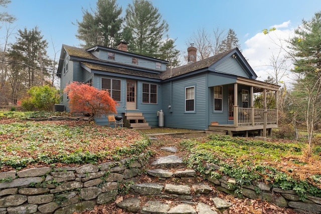 rear view of house with a chimney
