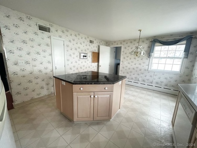 kitchen featuring pendant lighting, white dishwasher, dark stone countertops, baseboard heating, and a kitchen island