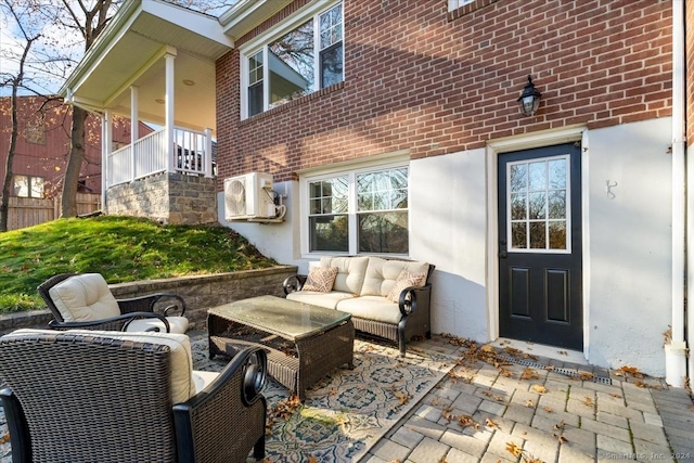 view of patio featuring ac unit