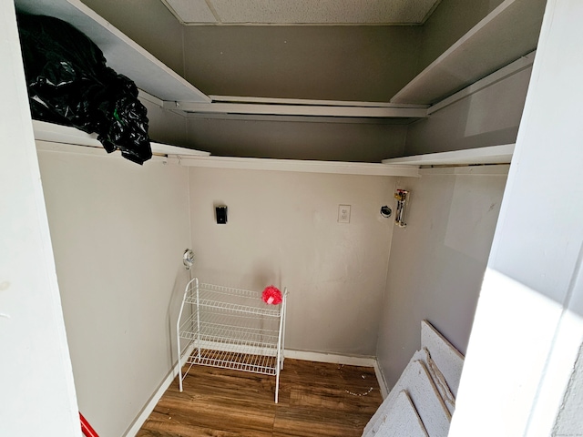 laundry room featuring hookup for an electric dryer and hardwood / wood-style floors