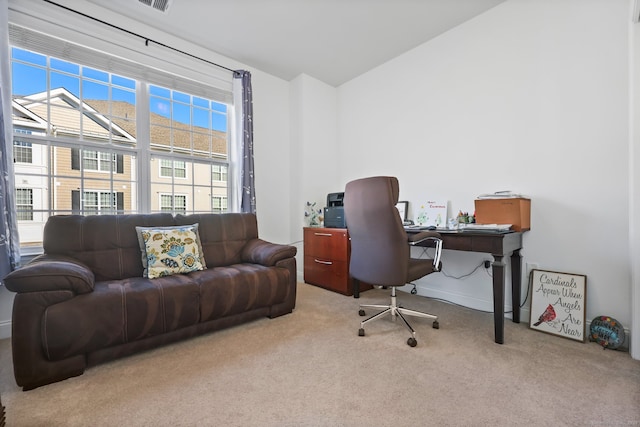 home office featuring light carpet