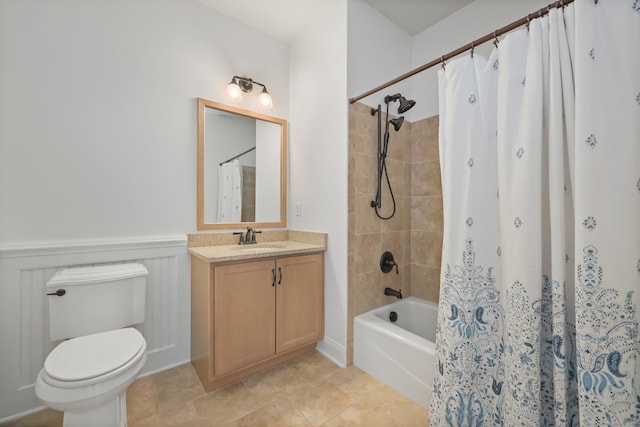 full bathroom featuring toilet, shower / tub combo, vanity, and tile patterned floors