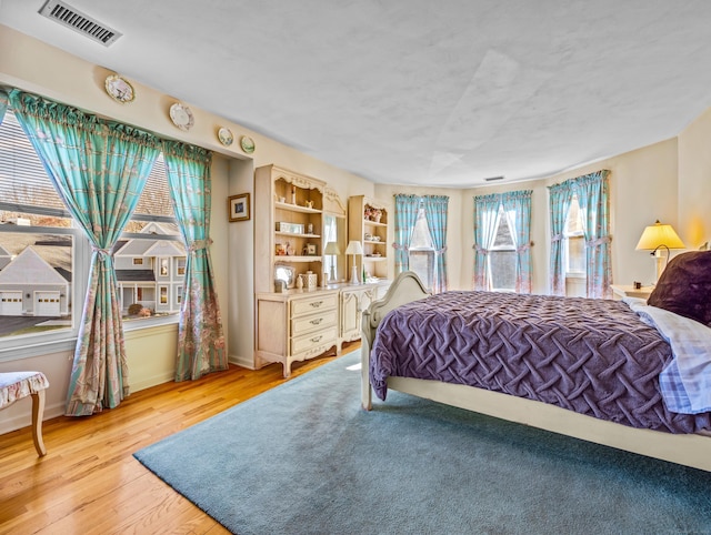 bedroom featuring light hardwood / wood-style floors