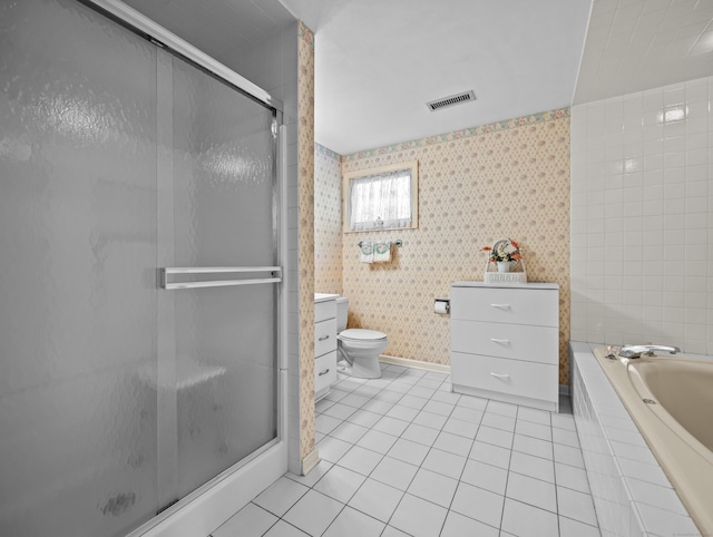 full bathroom featuring tile patterned floors, vanity, independent shower and bath, and toilet