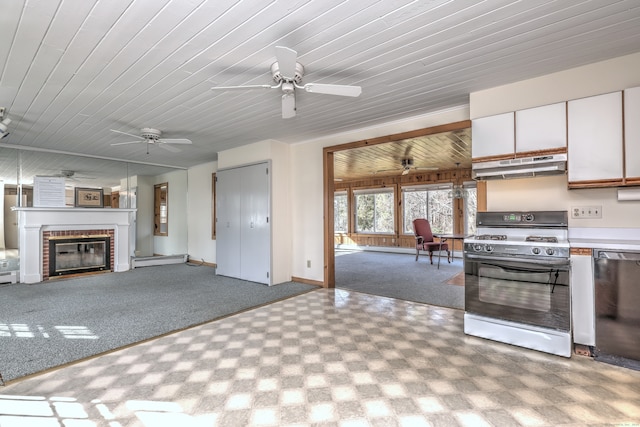 kitchen with a fireplace, white cabinetry, white range with gas stovetop, a baseboard radiator, and dishwasher