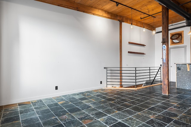 basement featuring wooden ceiling