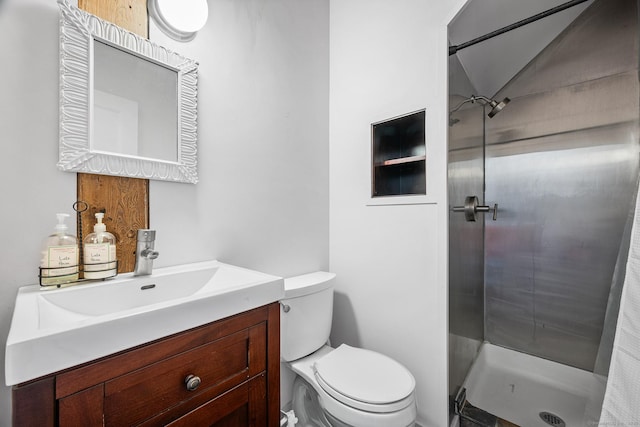 bathroom with toilet, vanity, lofted ceiling, and a shower with shower curtain