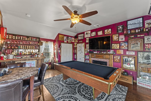 rec room with hardwood / wood-style flooring, ceiling fan, lofted ceiling, and billiards