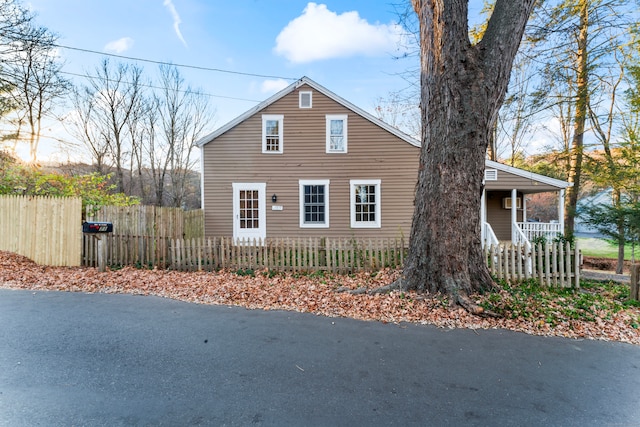 view of home's exterior with covered porch