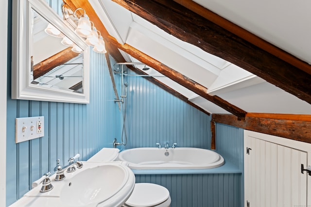 bathroom with toilet, a bath, and sink