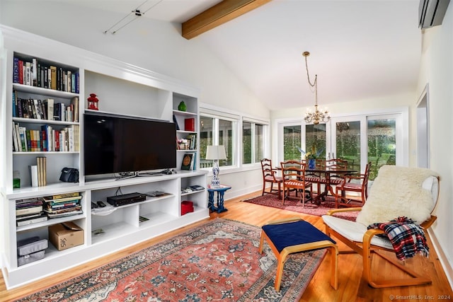 living room featuring vaulted ceiling with beams, an inviting chandelier, and hardwood / wood-style flooring