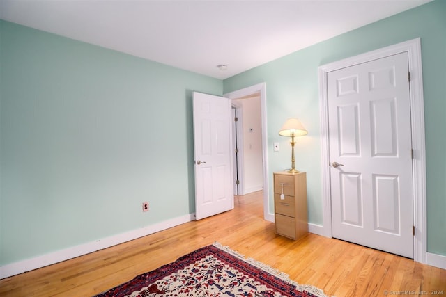 bedroom featuring light wood-type flooring