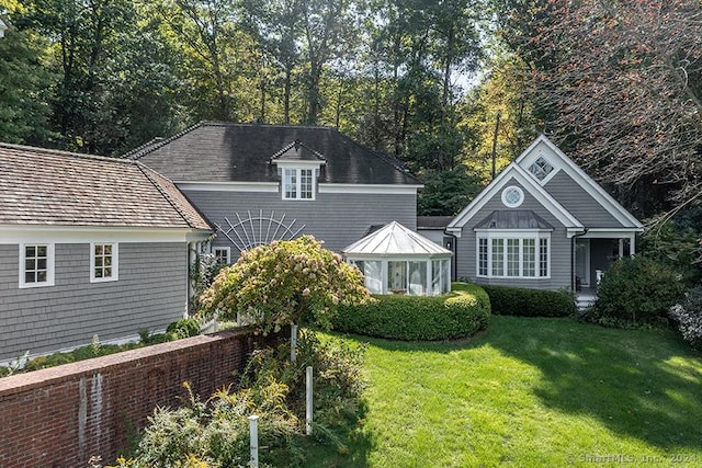 view of front of home with a front yard