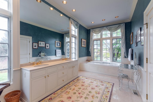 bathroom featuring double vanity, visible vents, tile patterned floors, crown molding, and a bath