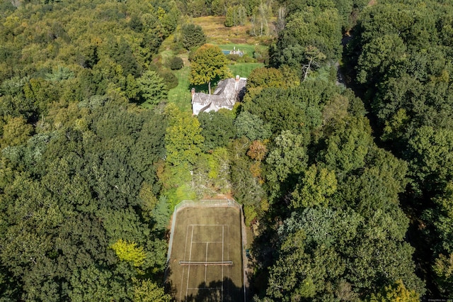 bird's eye view featuring a forest view