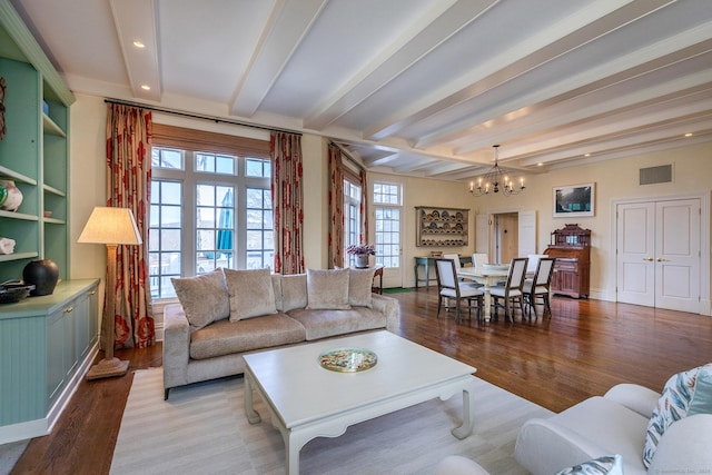 11 Ravenrock Rd, Roxbury, CT 06783 - living room with a chandelier, wood finished floors, beam ceiling, recessed lighting, and baseboards