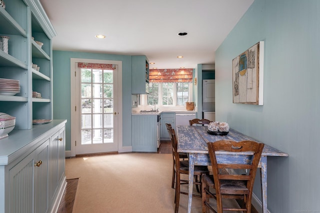 11 Ravenrock Rd, Roxbury, CT 06783 - dining area with stacked washer / dryer, light carpet, recessed lighting, and baseboards