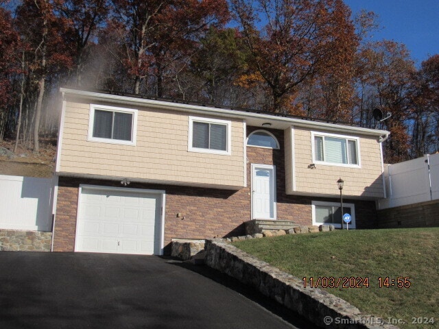 bi-level home with a garage