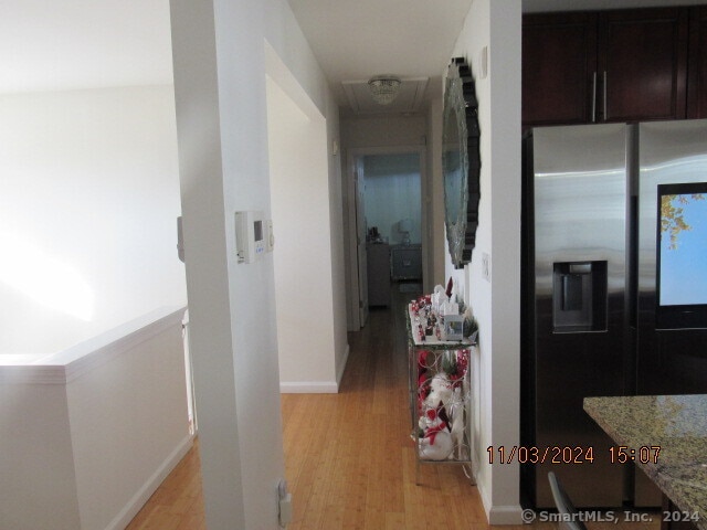 hallway featuring light wood-type flooring