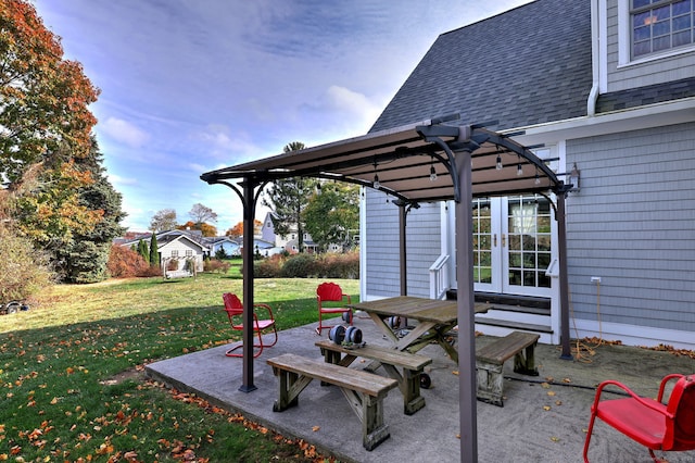 view of patio / terrace featuring a pergola and french doors