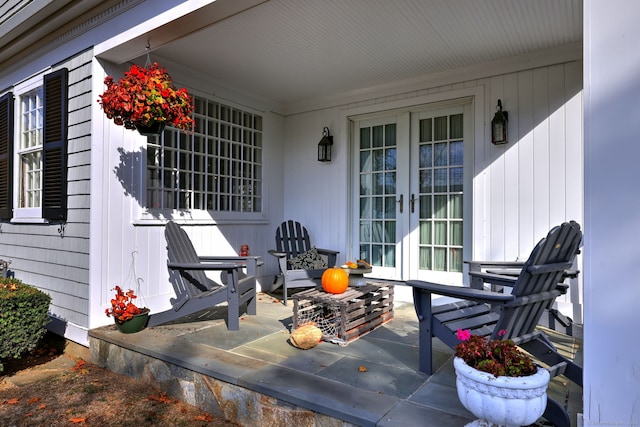 view of patio / terrace with covered porch and french doors