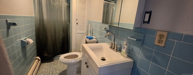 bathroom featuring toilet, tile walls, a shower with curtain, baseboard heating, and vanity