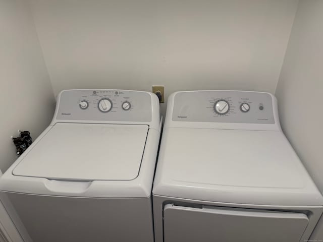 laundry room featuring separate washer and dryer