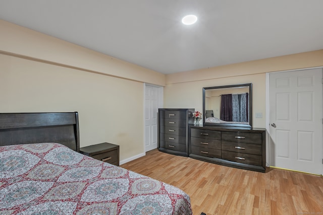 bedroom featuring light wood-type flooring