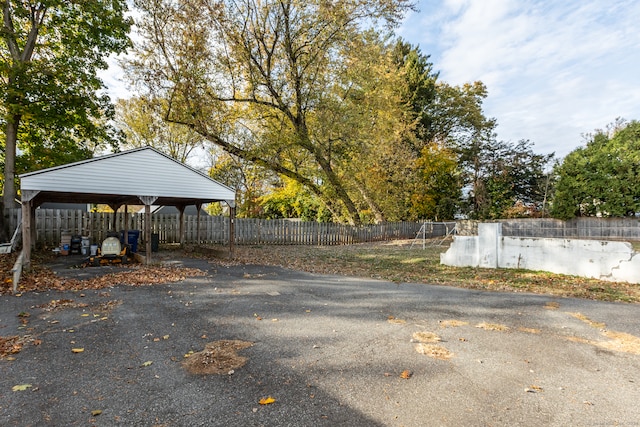 exterior space with a carport