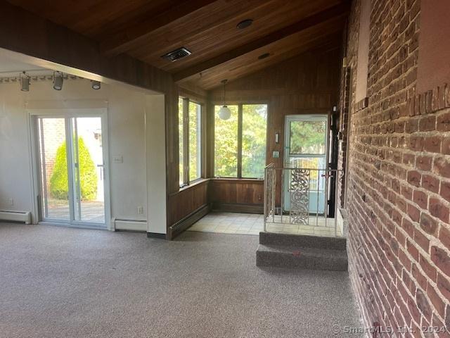 39 Rockefeller Ave, West Haven, CT 06516 - unfurnished sunroom with plenty of natural light and baseboard heating